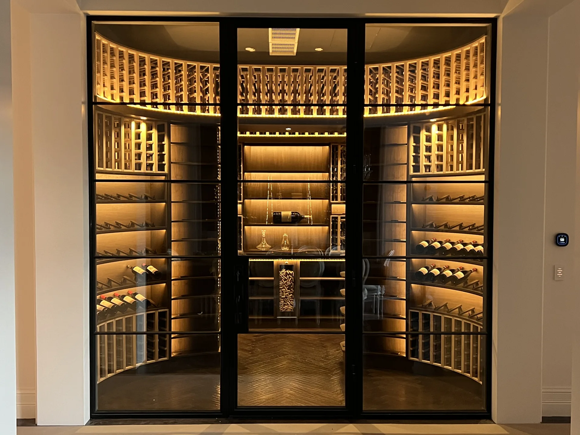 The Jupiter Curved Sanctuary, a massive Curve Racking wine cellar in a Jupiter, FL estate